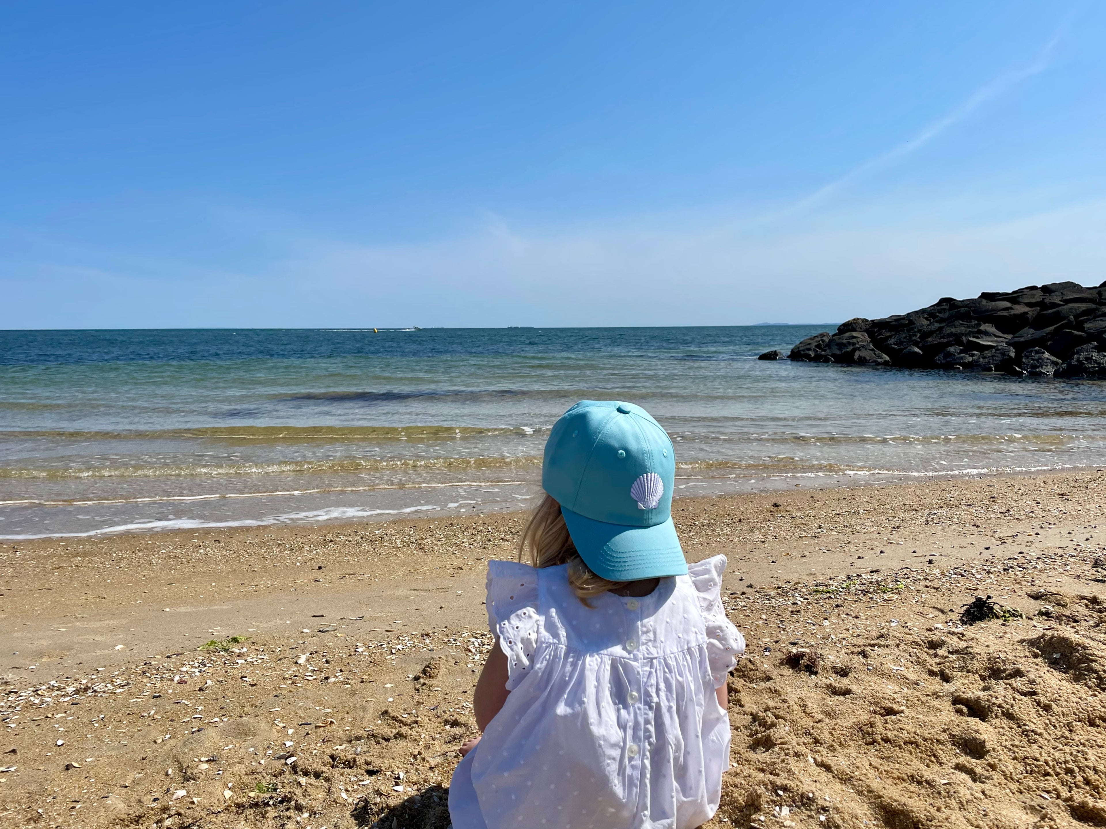 a girl using our Shell Cap