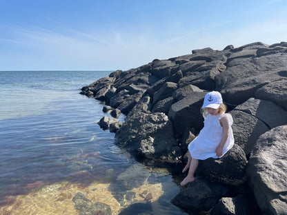 A little girl using the Anchor Cap